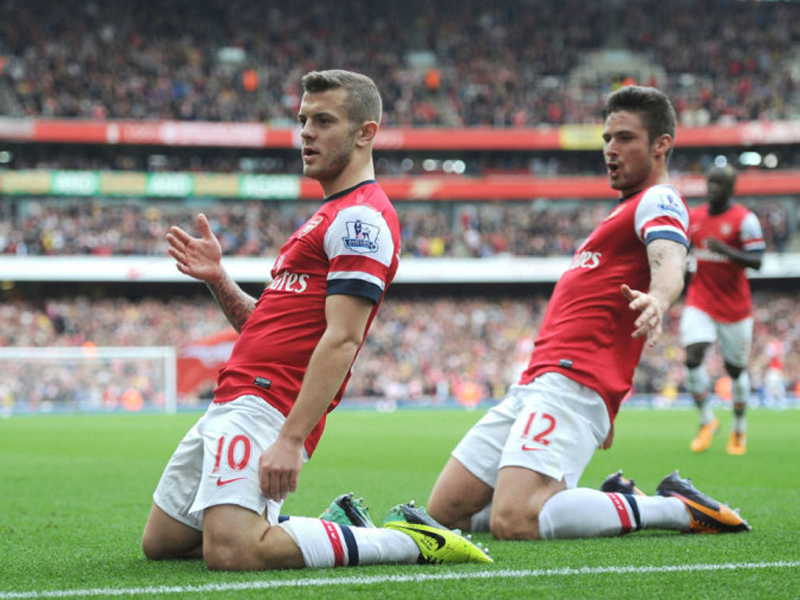 北京国安足协杯夺冠，法比奥荣膺金靴，球员拼尽全力，彰显拼搏精神。